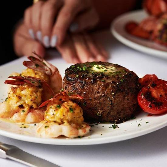 Order Petite Filet Mignon & Crab-Stuffed Shrimp Scampi food online from Fleming's Prime Steakhouse & Wine Bar store, The Woodlands on bringmethat.com