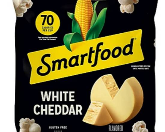 Order SmartFood White Cheddar Popcorn 8 oz food online from Rebel store, Magna on bringmethat.com