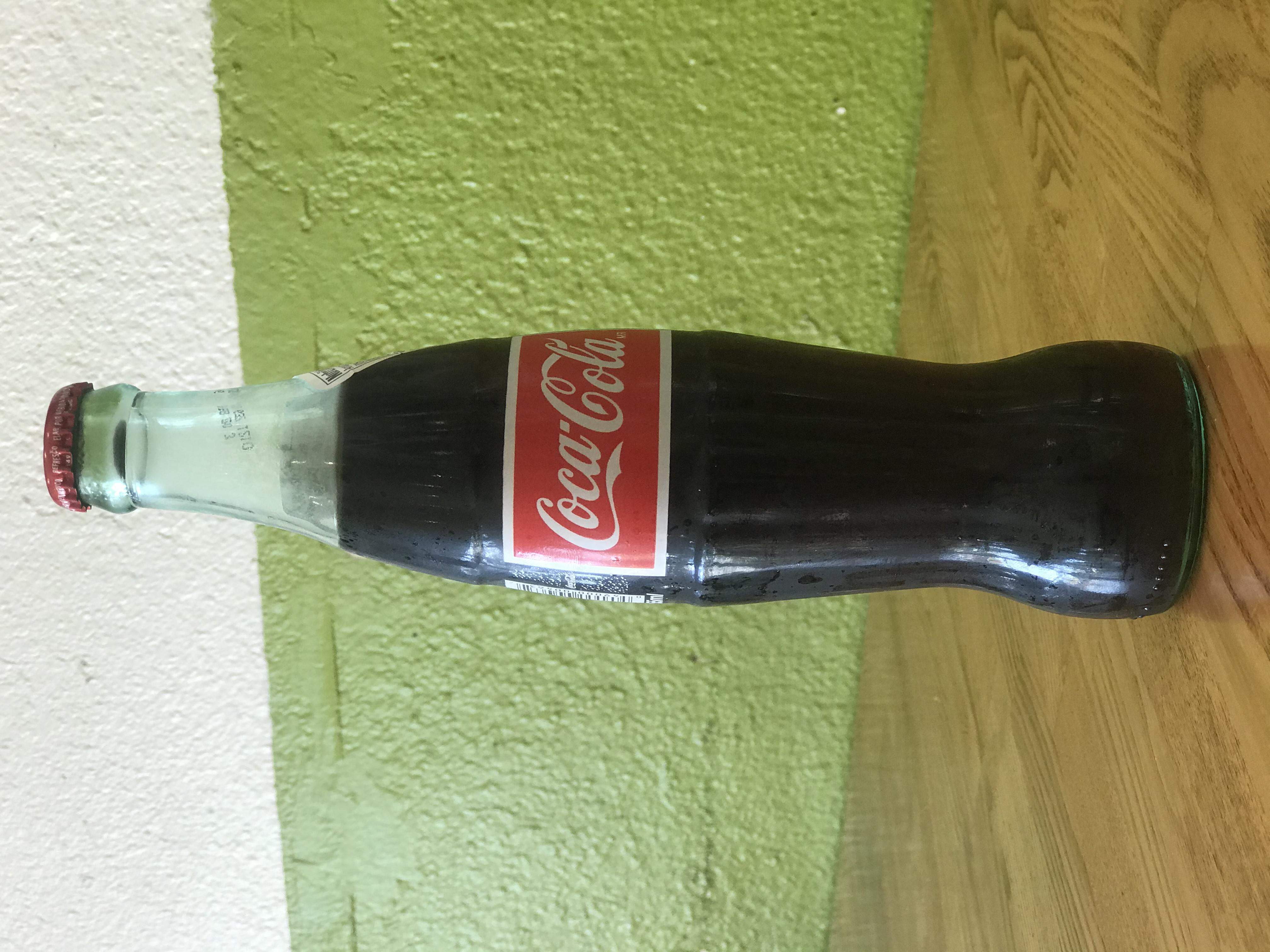 Order 12 oz. Mexican Coke food online from Namaste Pizza store, Fremont on bringmethat.com