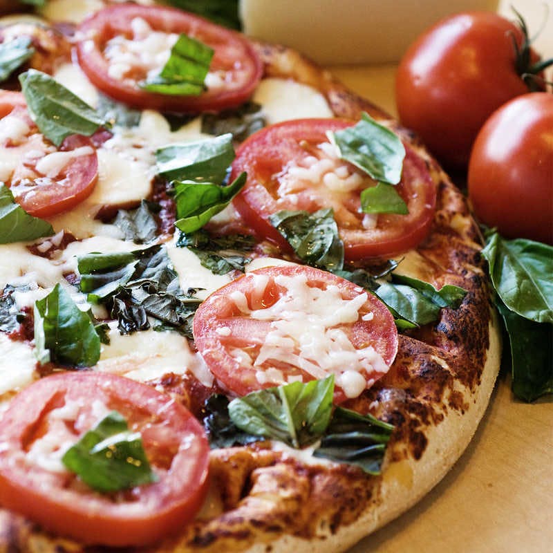 Order Margherita Pizza - Individual food online from Straw Hat Pizza store, Clovis on bringmethat.com