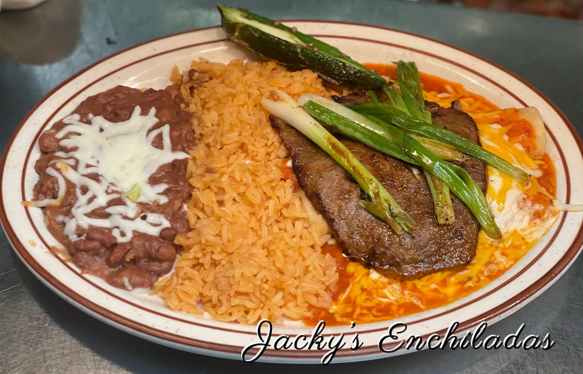 Order Jacky's Enchilada food online from Jacky's Restaurant store, Sioux Falls on bringmethat.com