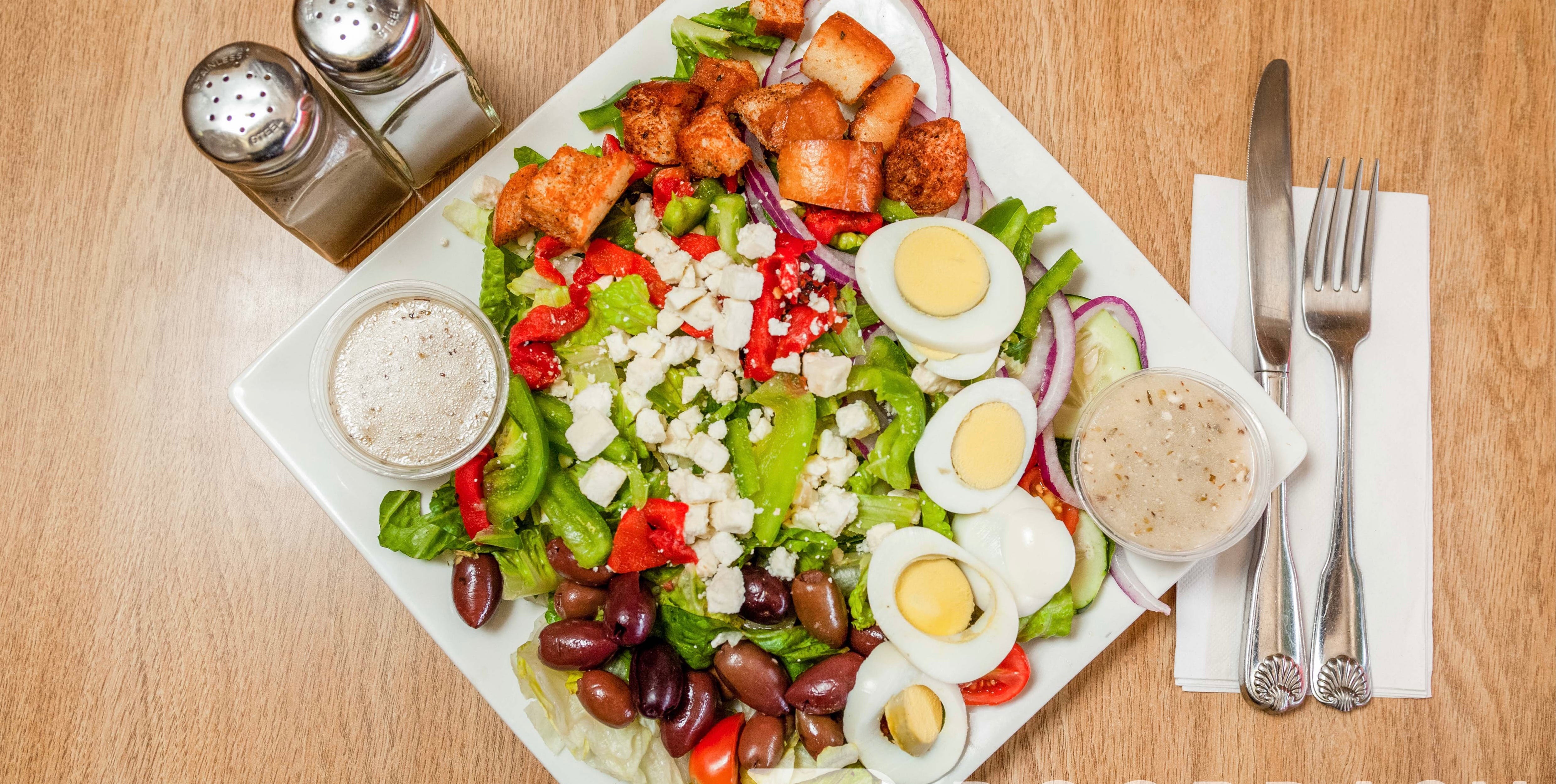 Order Greek Salad - Salads food online from Nonna Rosa Pizzeria store, Bridgeport on bringmethat.com