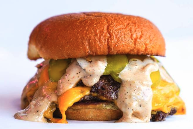 Order Signature Smash Burger food online from Smashd Burgers & Fries store, Los Angeles on bringmethat.com