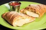 Order Deluxe Cheese Calzone food online from Mio Pizza store, Cincinnati on bringmethat.com