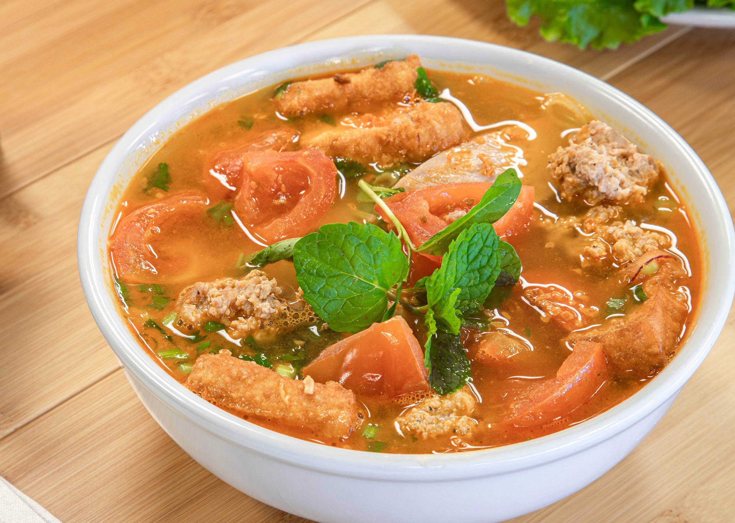 Order 37. Bun Rieu Tomatoes Broth Soup food online from Pho Cafe Hong Kong Diner store, Reno on bringmethat.com
