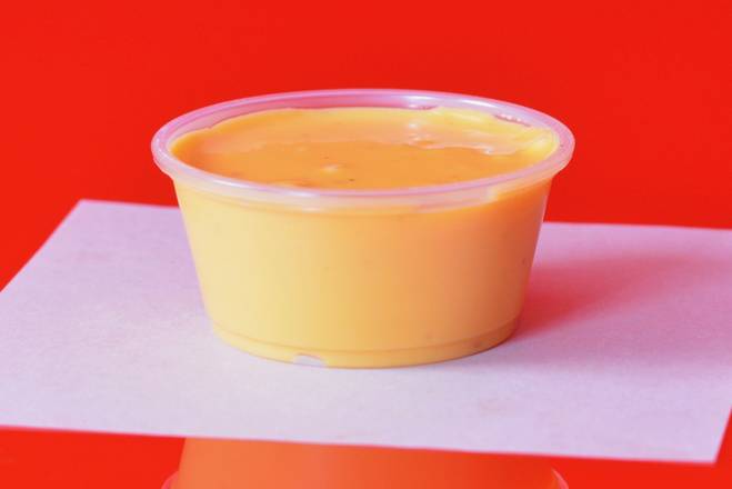 Order Melted Cheese Sauce Side food online from Super Smash Burgers store, Garden Grove on bringmethat.com