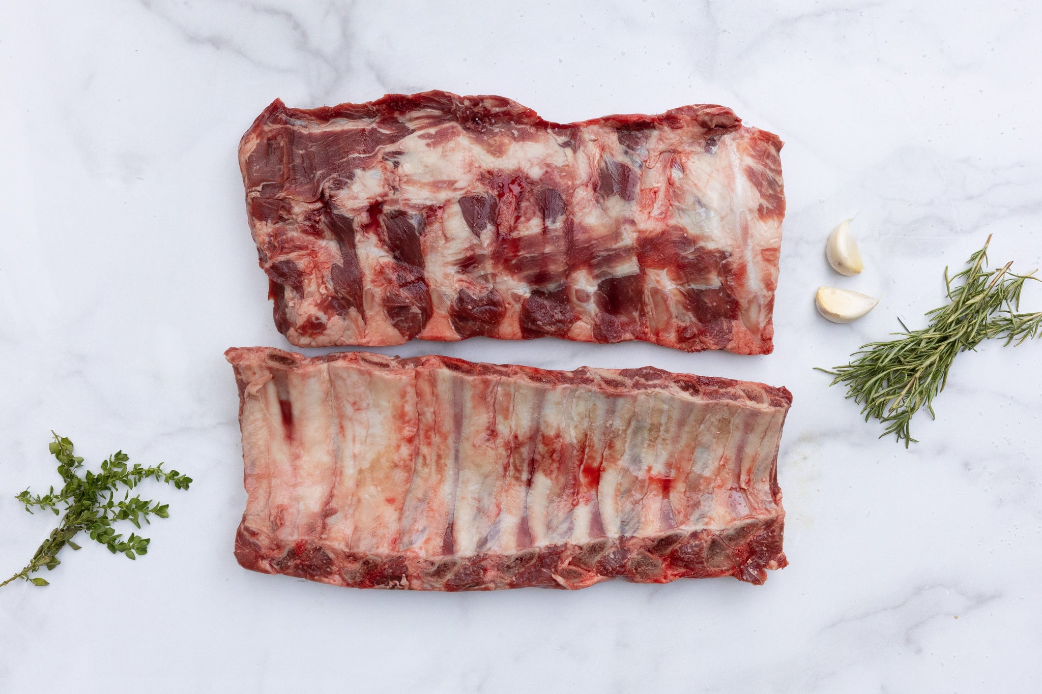 Order Grain Fed Back Ribs food online from Agridime Meats store, Gilbert on bringmethat.com