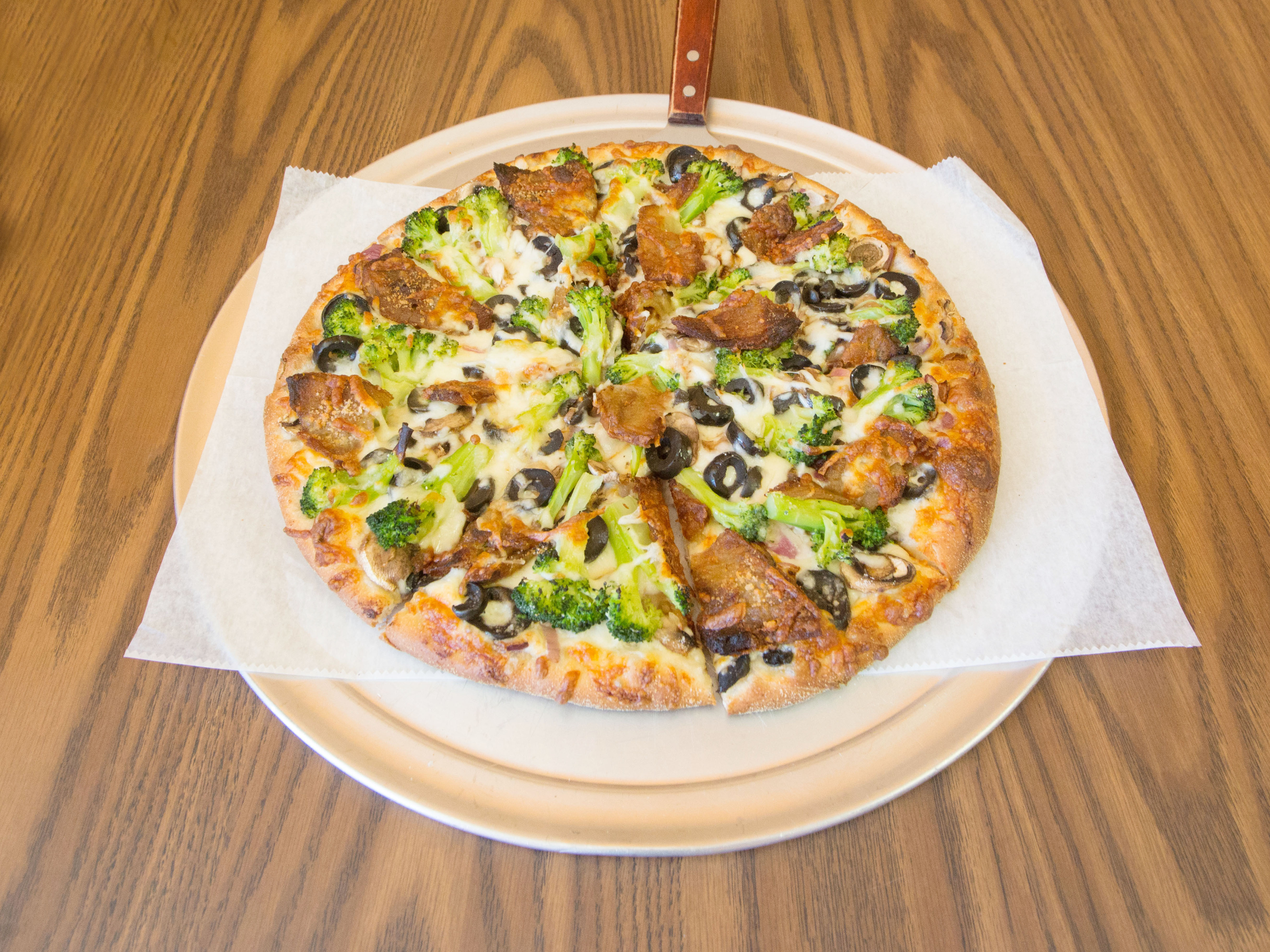 Order Veggie Lover's Pizza food online from Pizza Towne store, Westfield on bringmethat.com