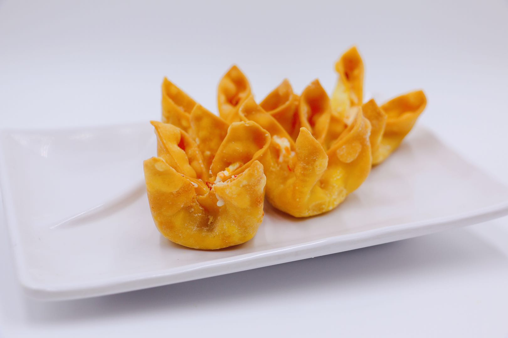 Order Crab Rangoon (4) food online from Sushi King store, Charlottesville on bringmethat.com