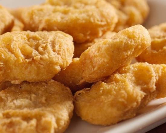 Order 12 piece Chicken Nuggets food online from California Donuts store, Stockton on bringmethat.com