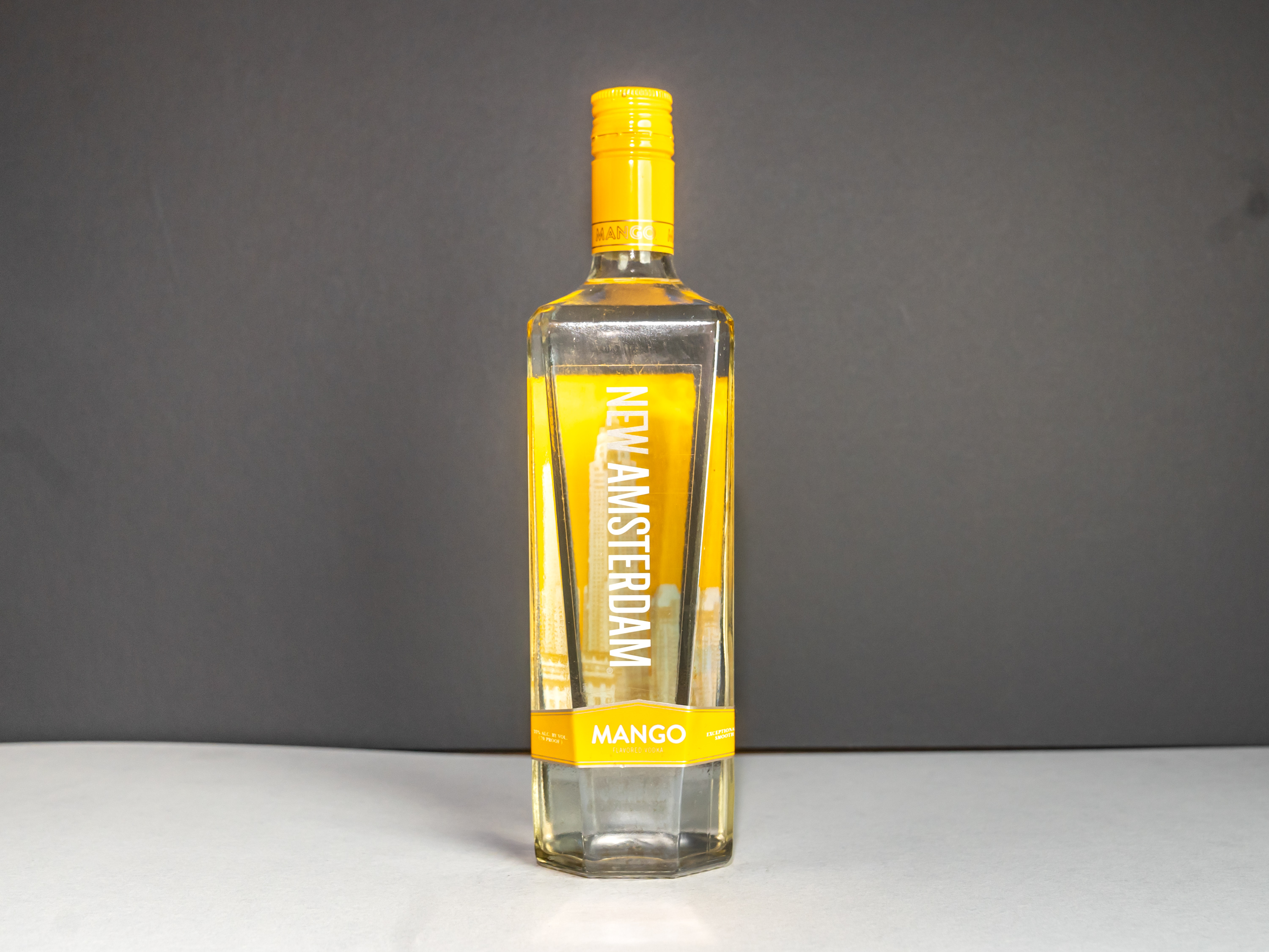 Order New Amsterdam Pineapple Flavored, 750 ml Vodka food online from State Market store, San Francisco on bringmethat.com