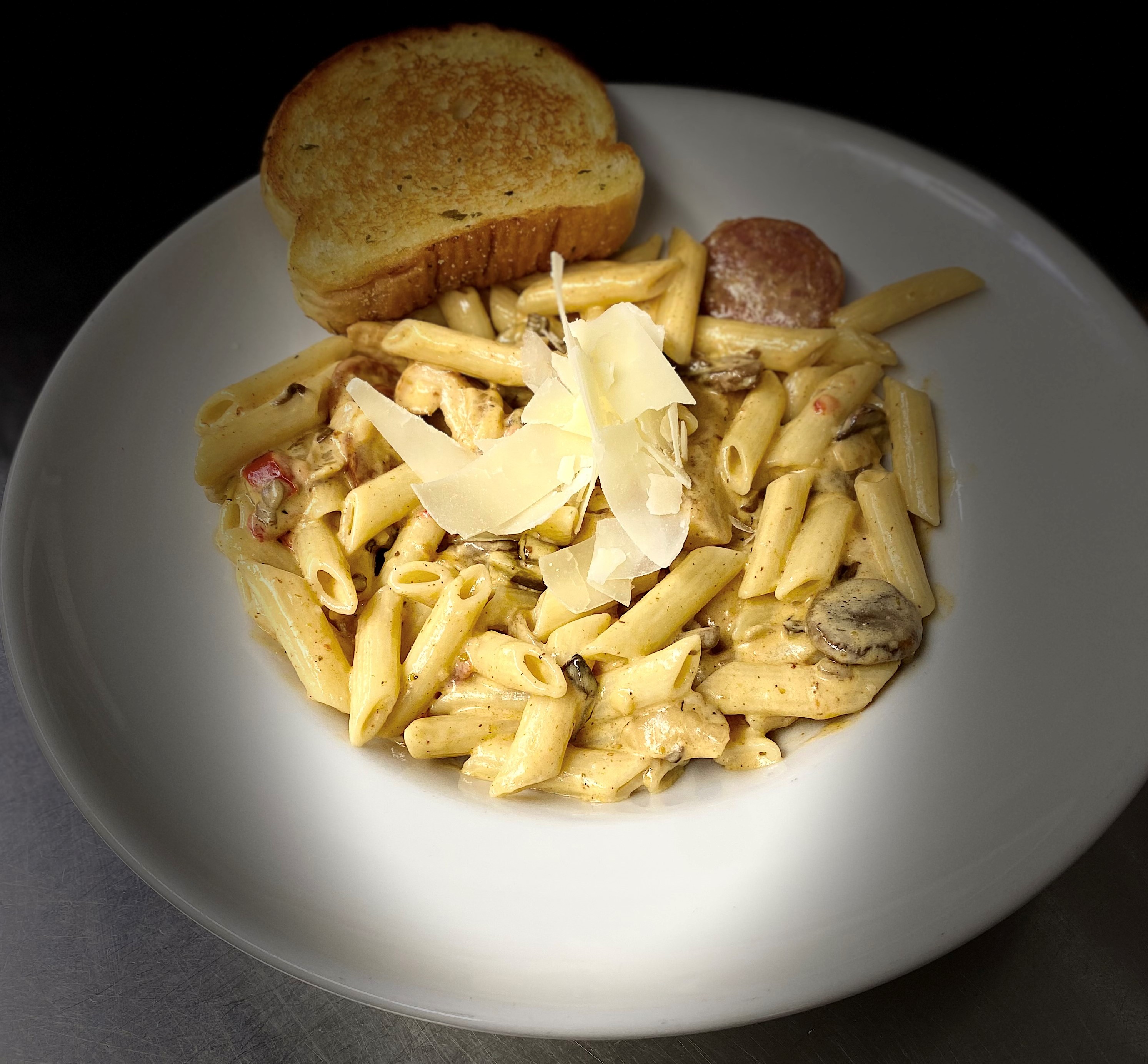 Order Cajun Chicken & Sausage Pasta food online from Verde Lounge store, Sioux Falls on bringmethat.com