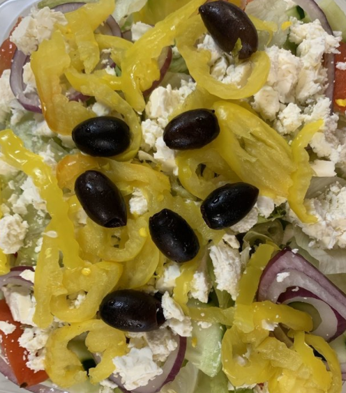 Order Greek Salad food online from Giardino Pizza store, Vinton on bringmethat.com