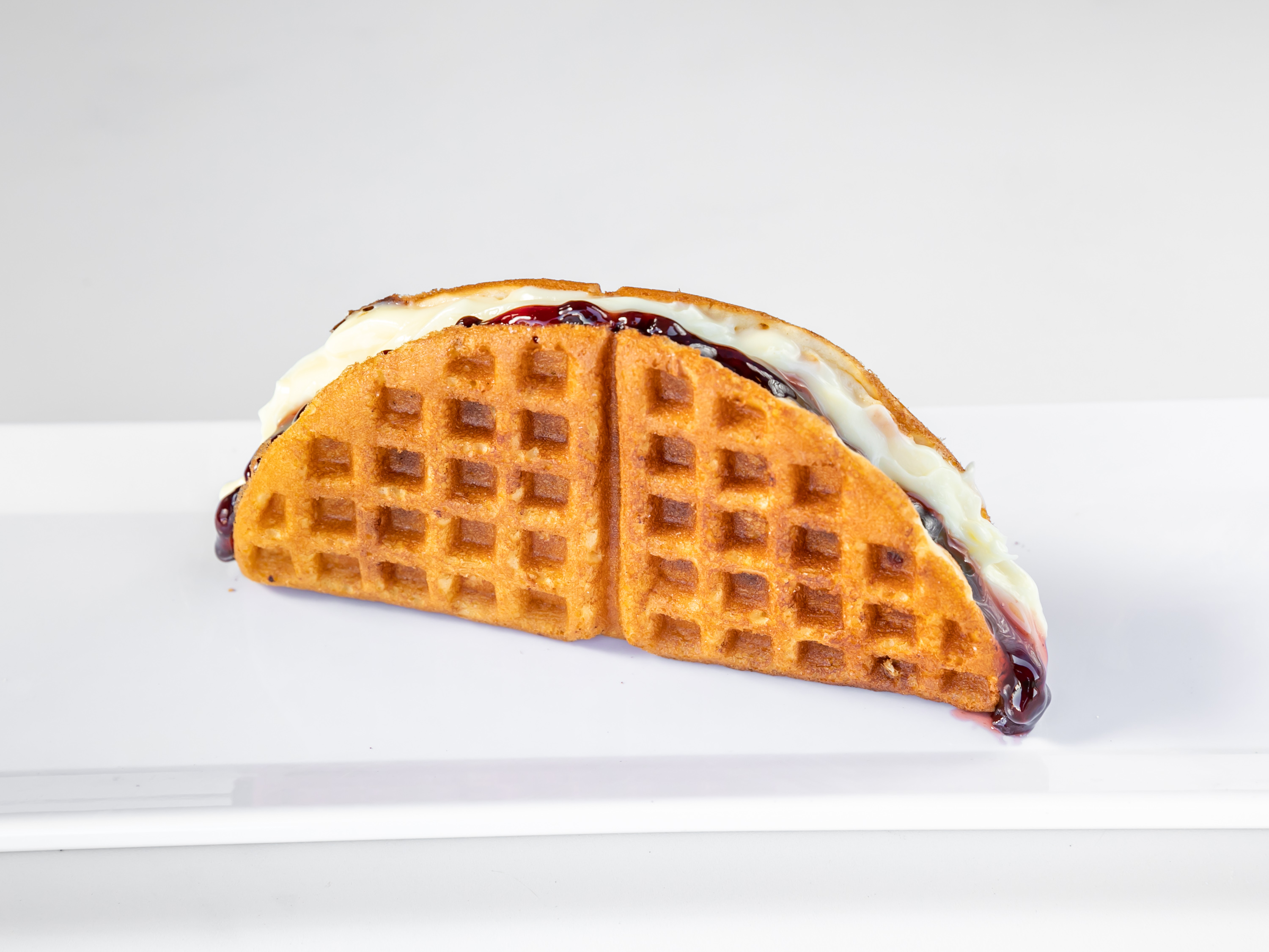 Order Blueberry and Custard Waffle Sandwich food online from Famous Waffle Sandwich store, San Diego on bringmethat.com