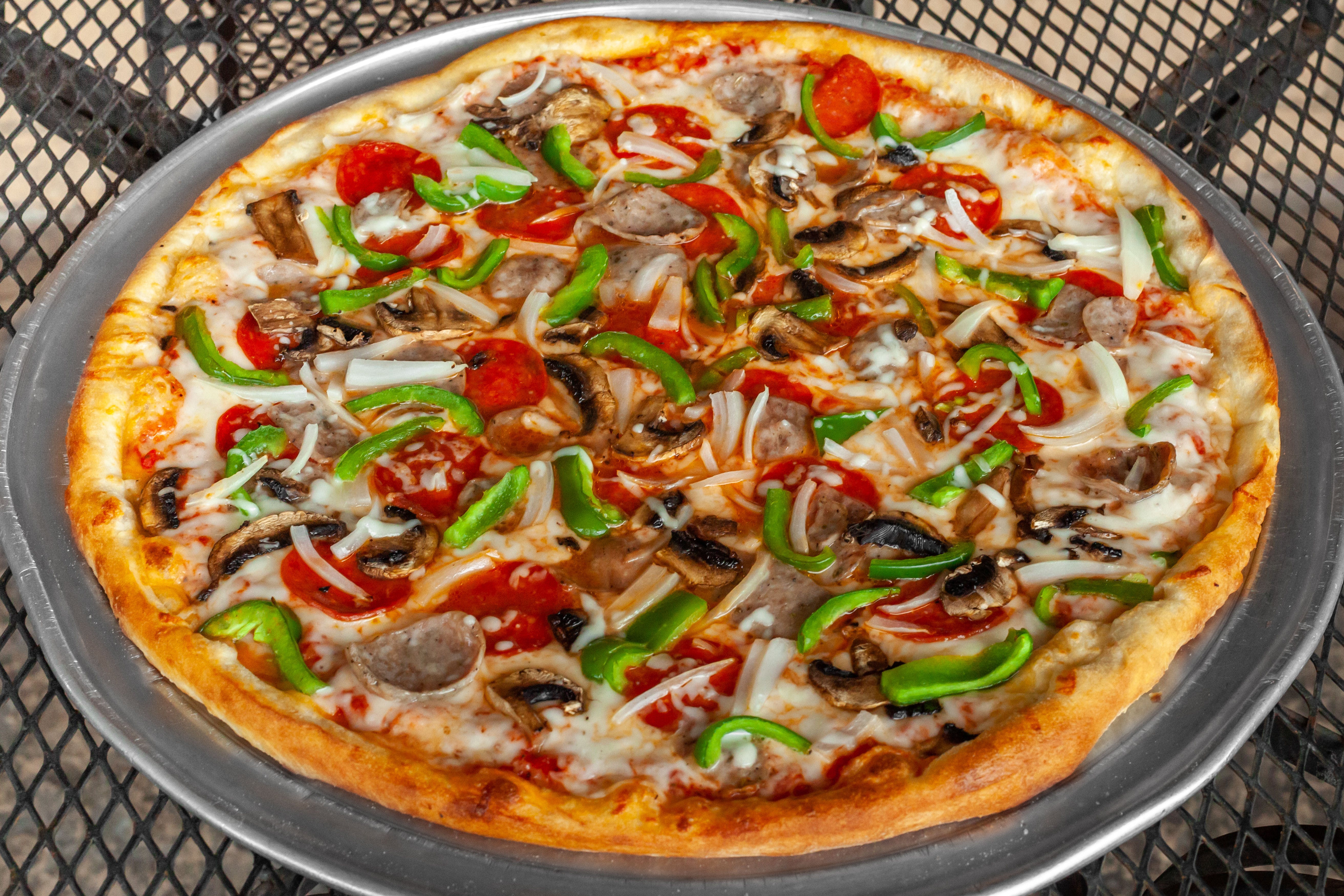 Order Italian Combination Pizza - Small 10" food online from Italian Delight of Powhatan store, Powhatan on bringmethat.com