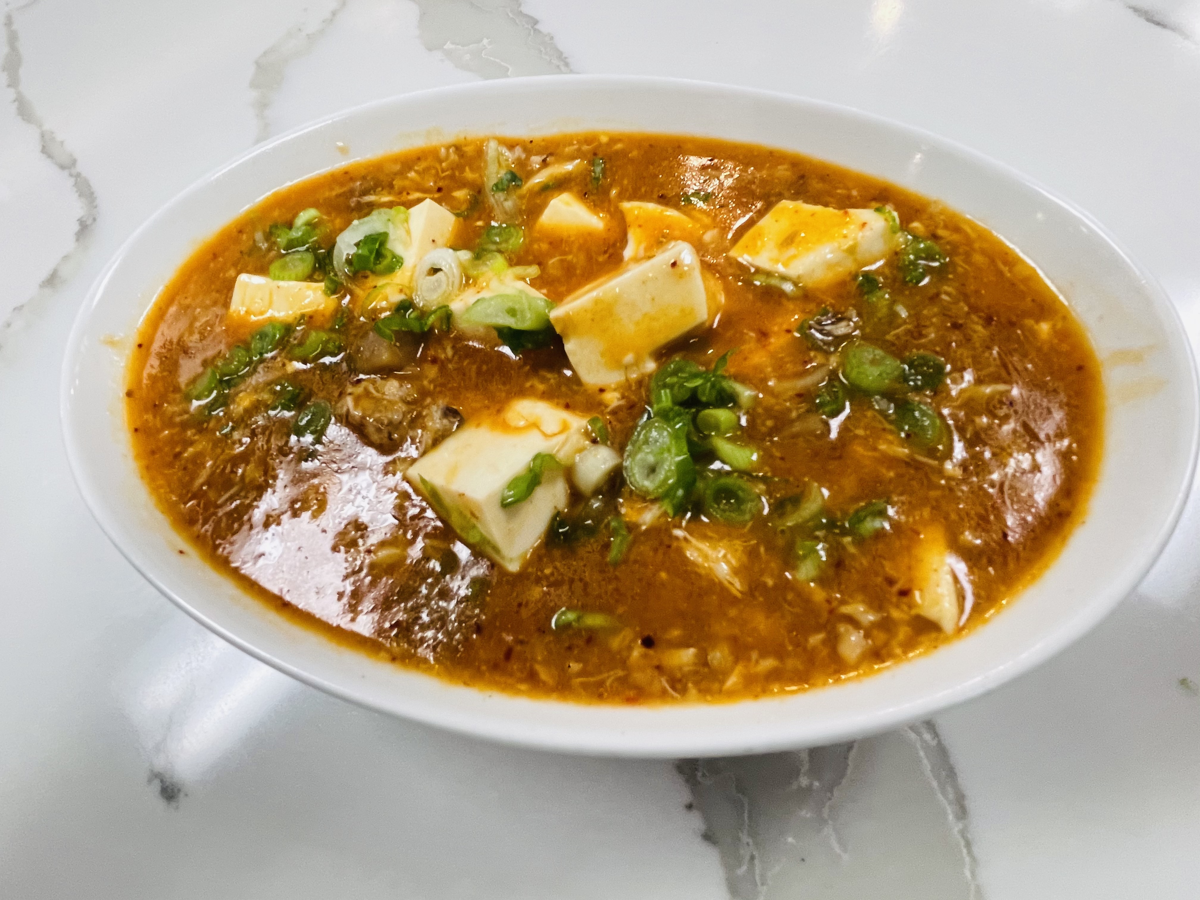 Order mapo tofu with crab food online from Dan Modern Chinese store, Playa Vista on bringmethat.com