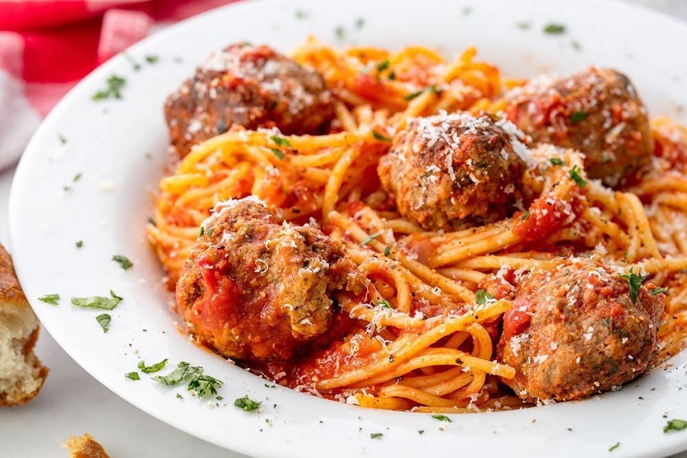 Order 5. Spaghetti & Meatballs - Pasta di Casa food online from Oakhurst Pizza store, Oakhurst on bringmethat.com
