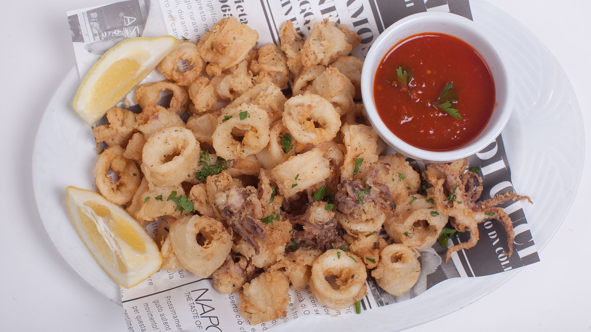 Order Fried Calamari food online from Umberto's Pizzeria store, New Hyde Park on bringmethat.com