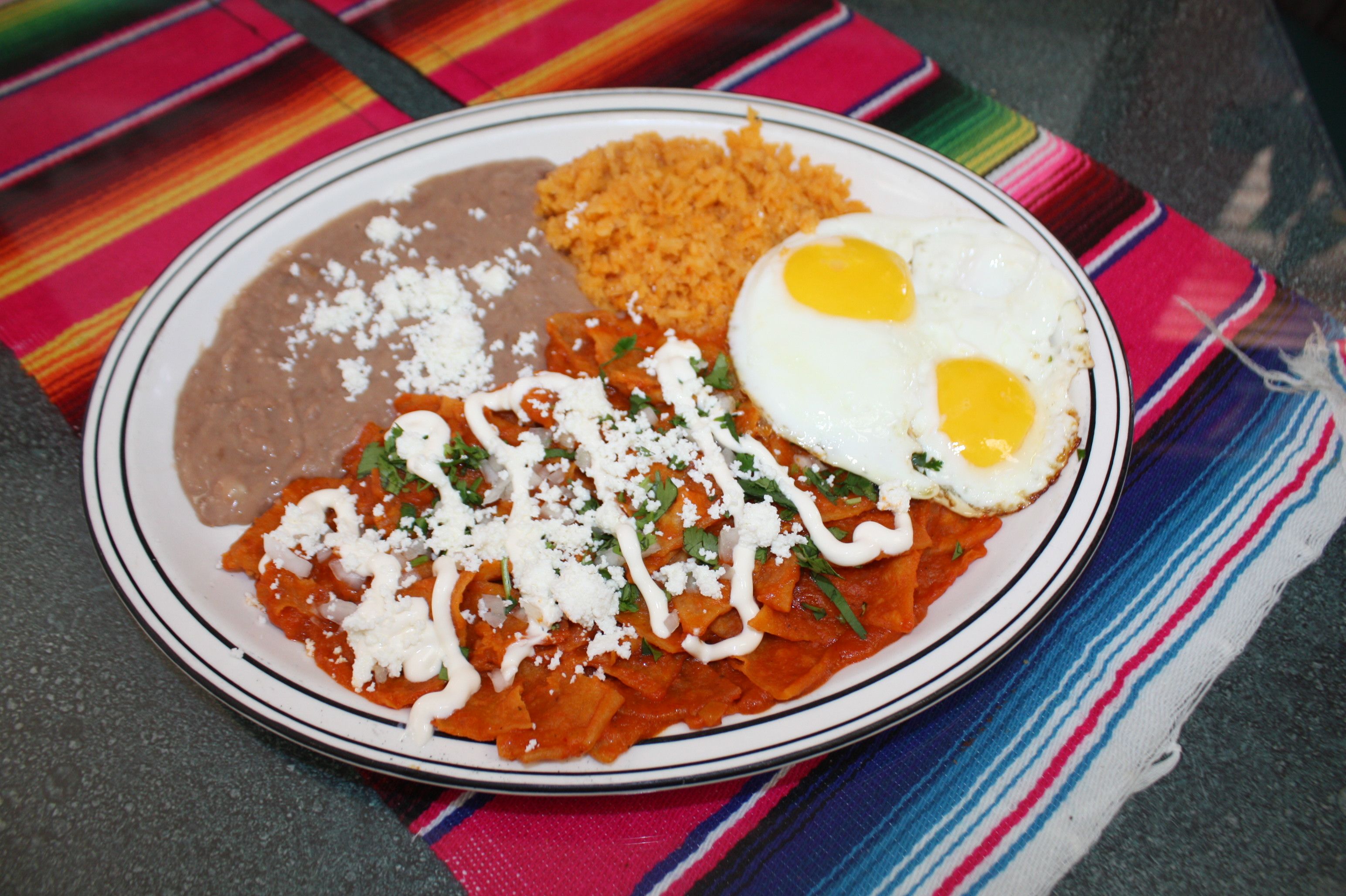 Order Chilaquiles con Huevos food online from El Matador Authentic Mexican Food store, Pasadena on bringmethat.com