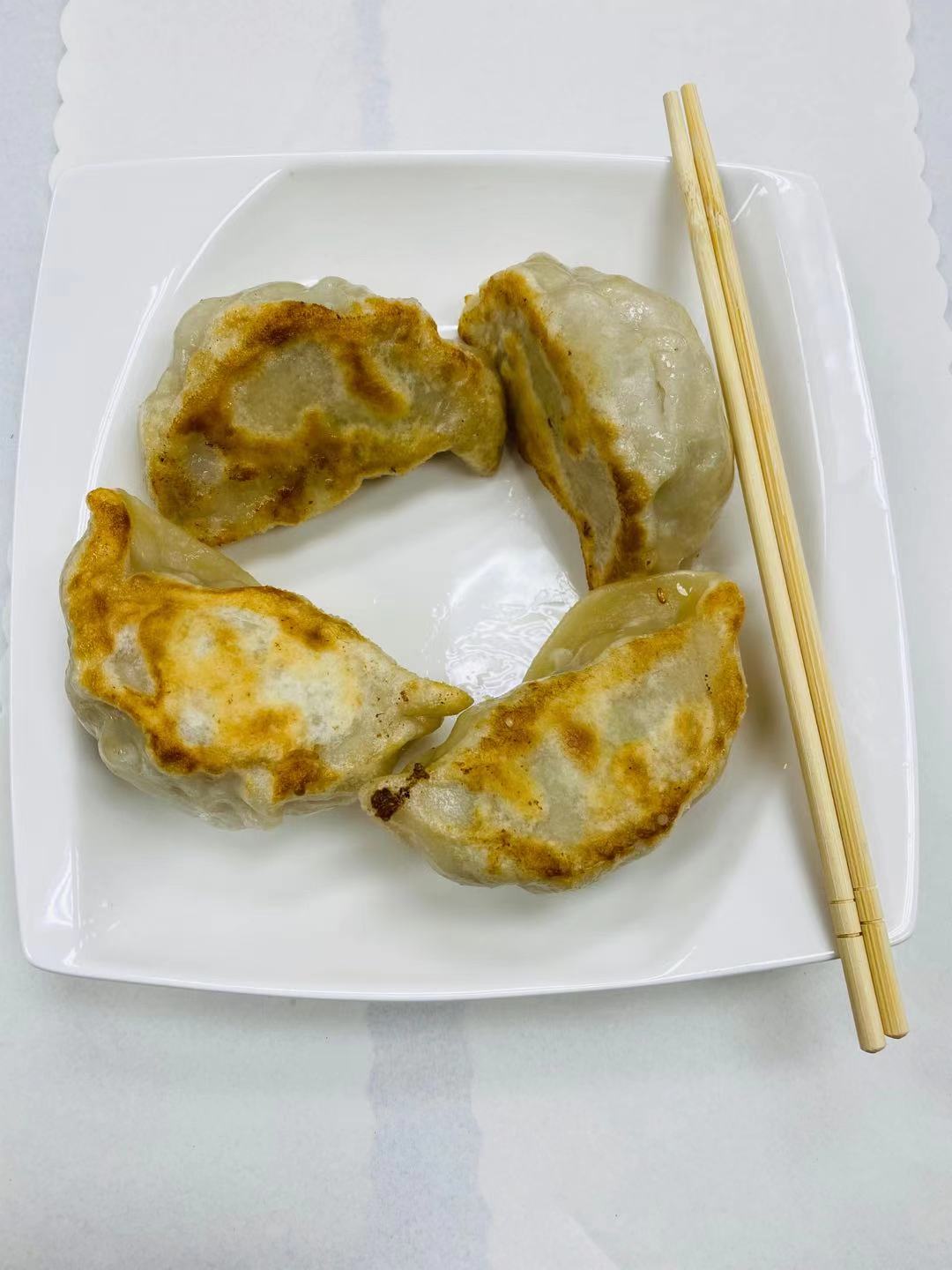 Order 29. Pan-Fried Pot Sticker with Pork   香煎鍋貼 food online from Dim Sum Bistro store, San Francisco on bringmethat.com