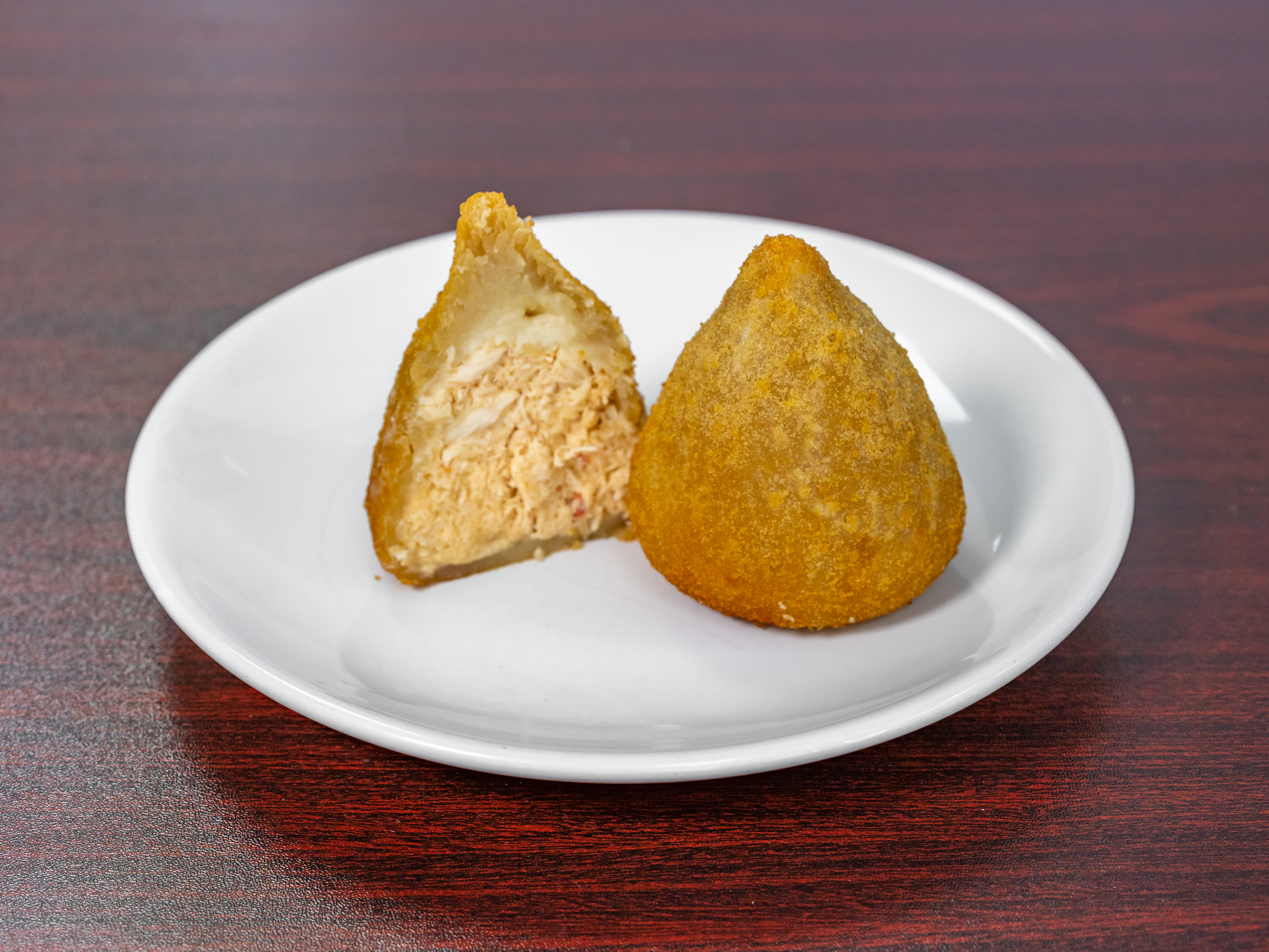 Order Coxinha food online from Padaria By Chef Andre Leite store, Utica on bringmethat.com