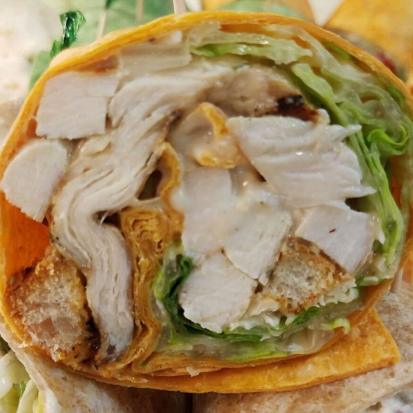 Order WR7. Chicken Caesar Salad Wrap food online from Iron tomato store, White Plains on bringmethat.com