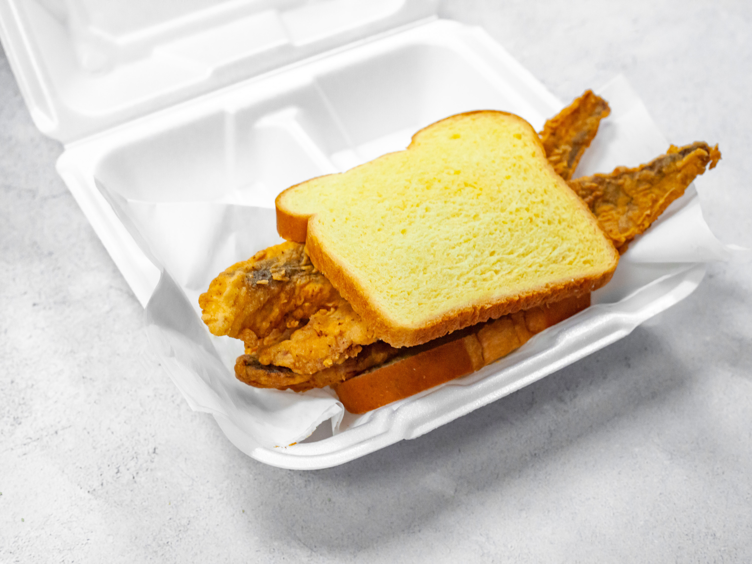 Order Fried Fish Sandwich food online from AHKIIS SOULFOOD store, Atlantic City on bringmethat.com