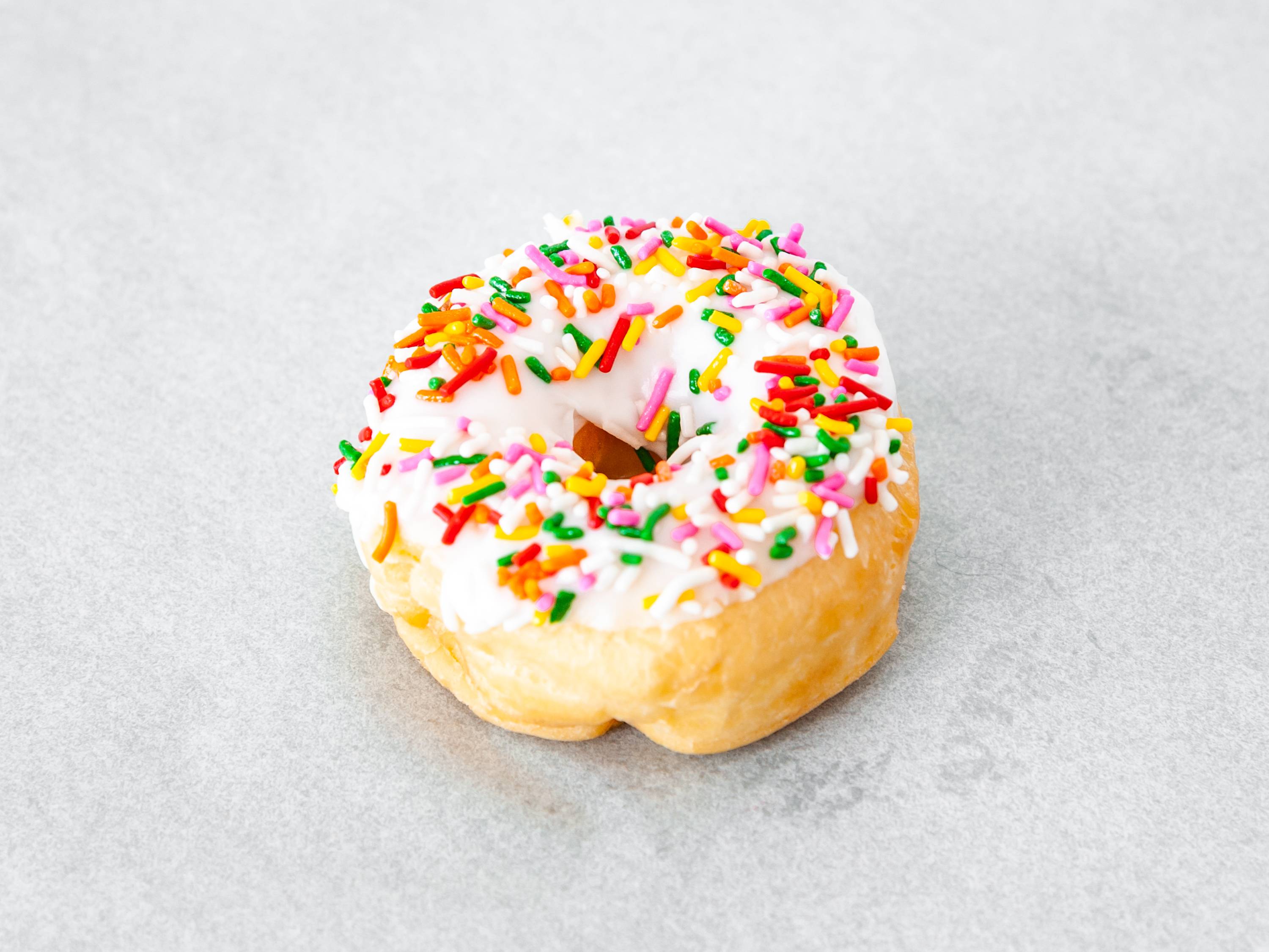 Order Sprinkles Donuts food online from Sweet Glazed Donuts store, Bossier City on bringmethat.com