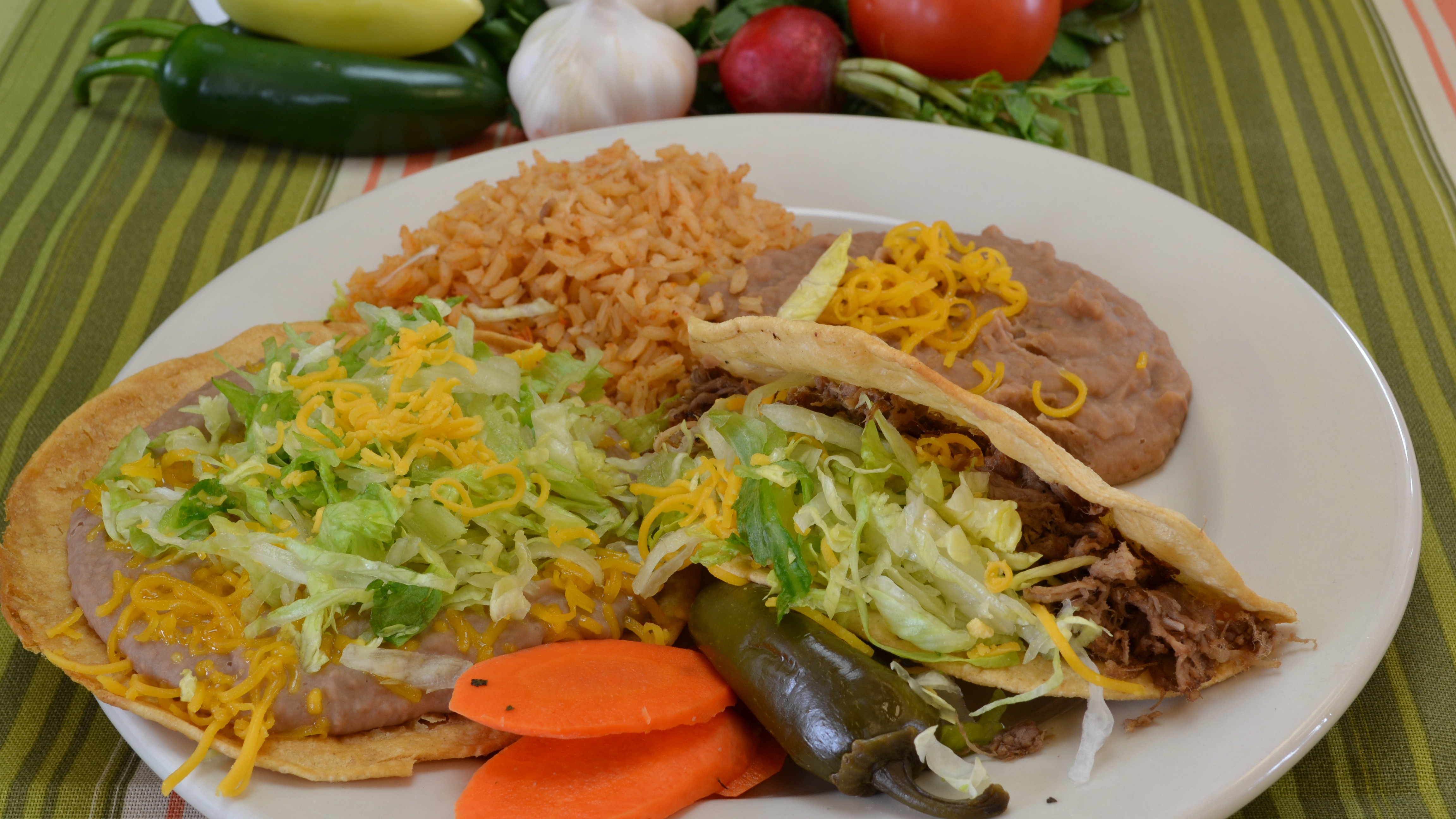 Order 1. Toastada and Beef Taco food online from Taco Plus store, Tucson on bringmethat.com