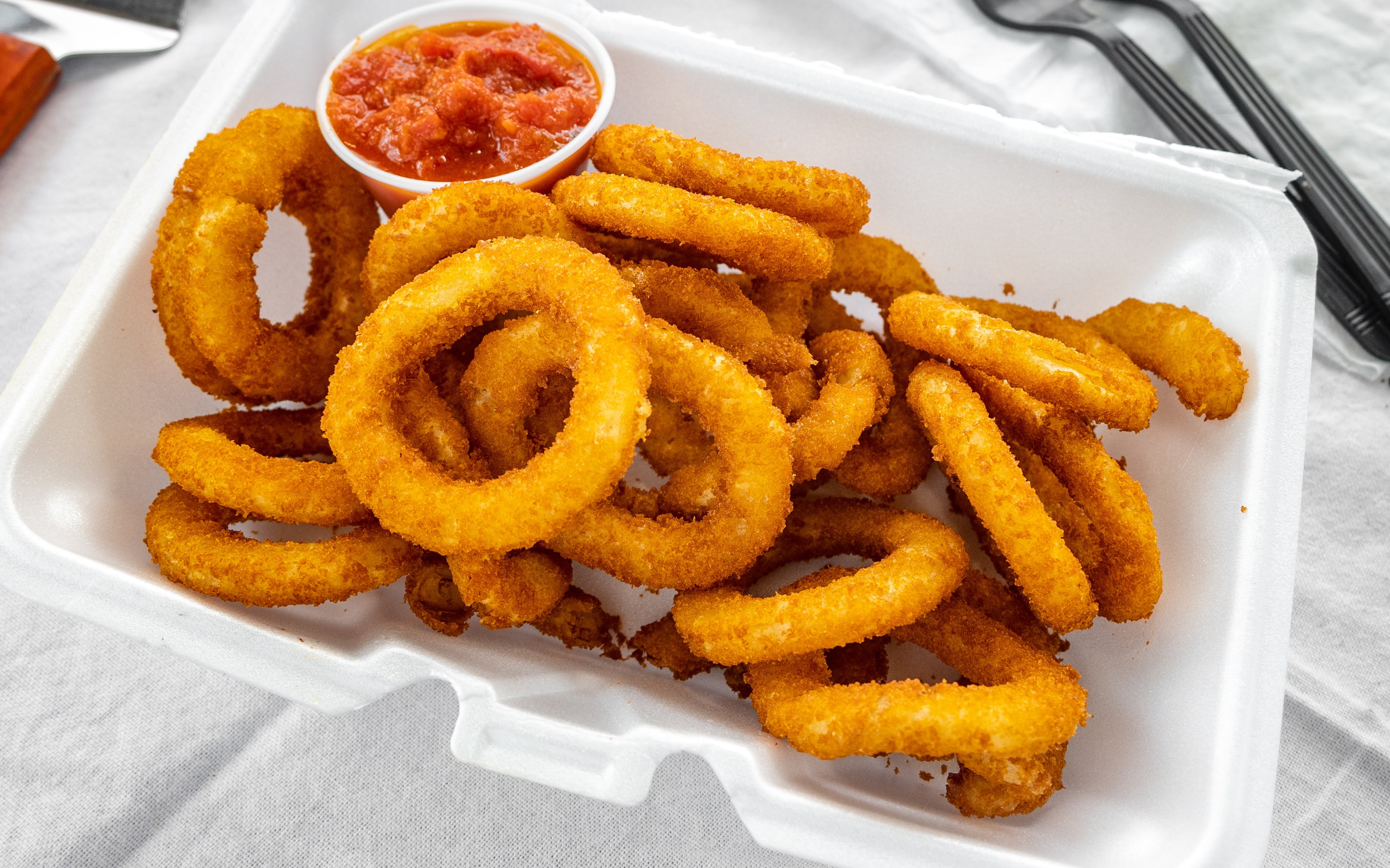 Order Onion Rings - Small food online from Golden Crust Pizzeria store, Philadelphia on bringmethat.com