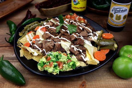 Order Super Nachos Mexicanos food online from Pika Tortas Ahogadas store, Paramount on bringmethat.com