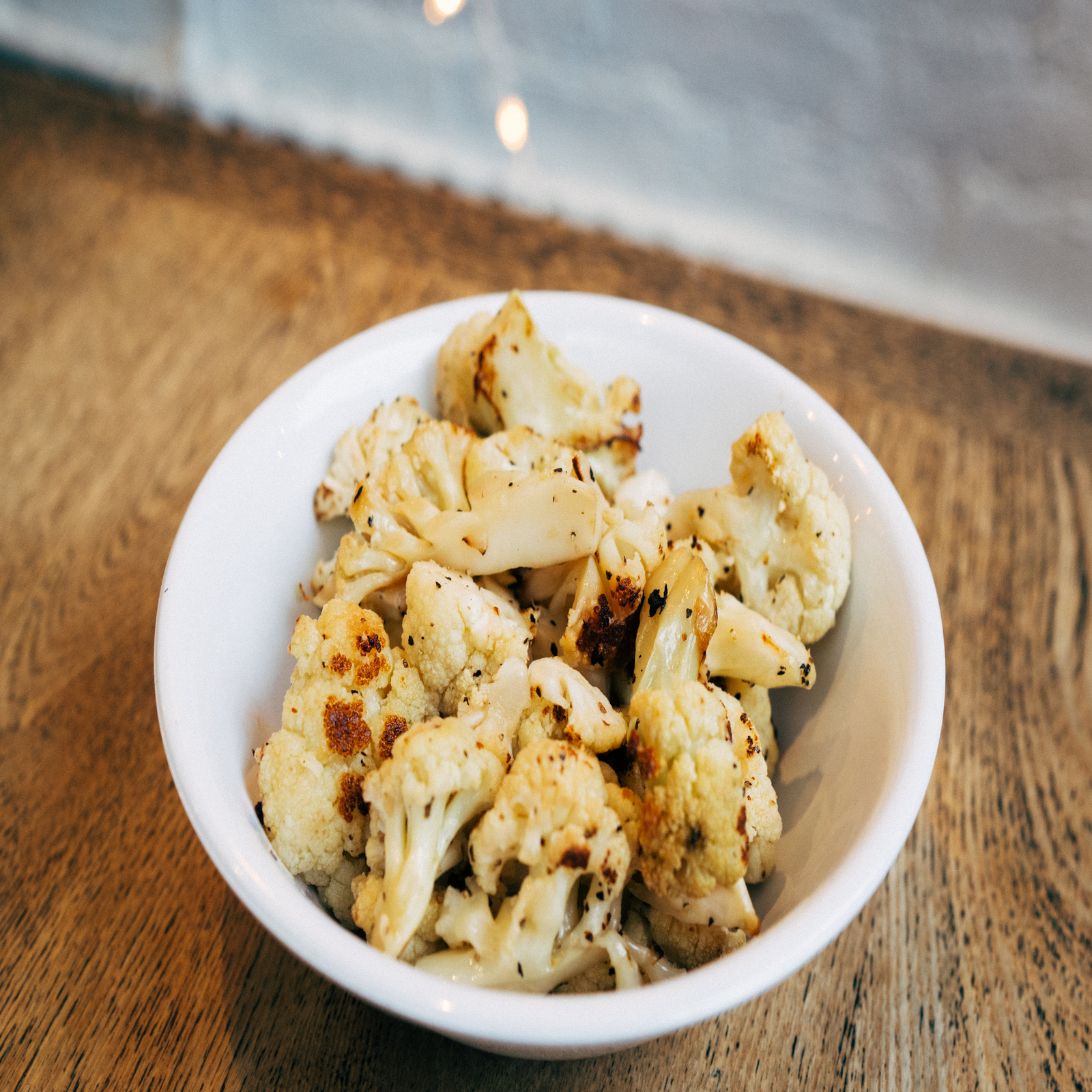 Order Sauteed Cauliflower 8oz food online from Poulette rotisserie chicken store, New York on bringmethat.com