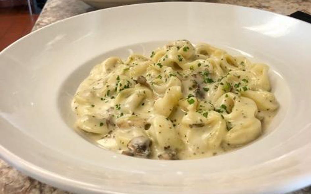 Order Tortellini Alla Panna - Pasta food online from Strings Italian Cafe store, Auburn on bringmethat.com