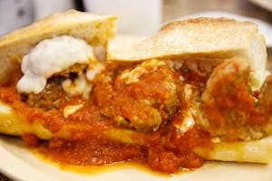Order Eggplant Parm Sand w/Chips food online from Milano Cafe & Deli store, Burbank on bringmethat.com