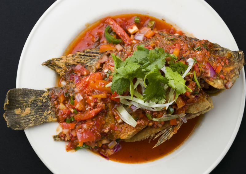 Order Whole Tilapia food online from Belacan Grill Malaysian Bistro store, Tustin on bringmethat.com