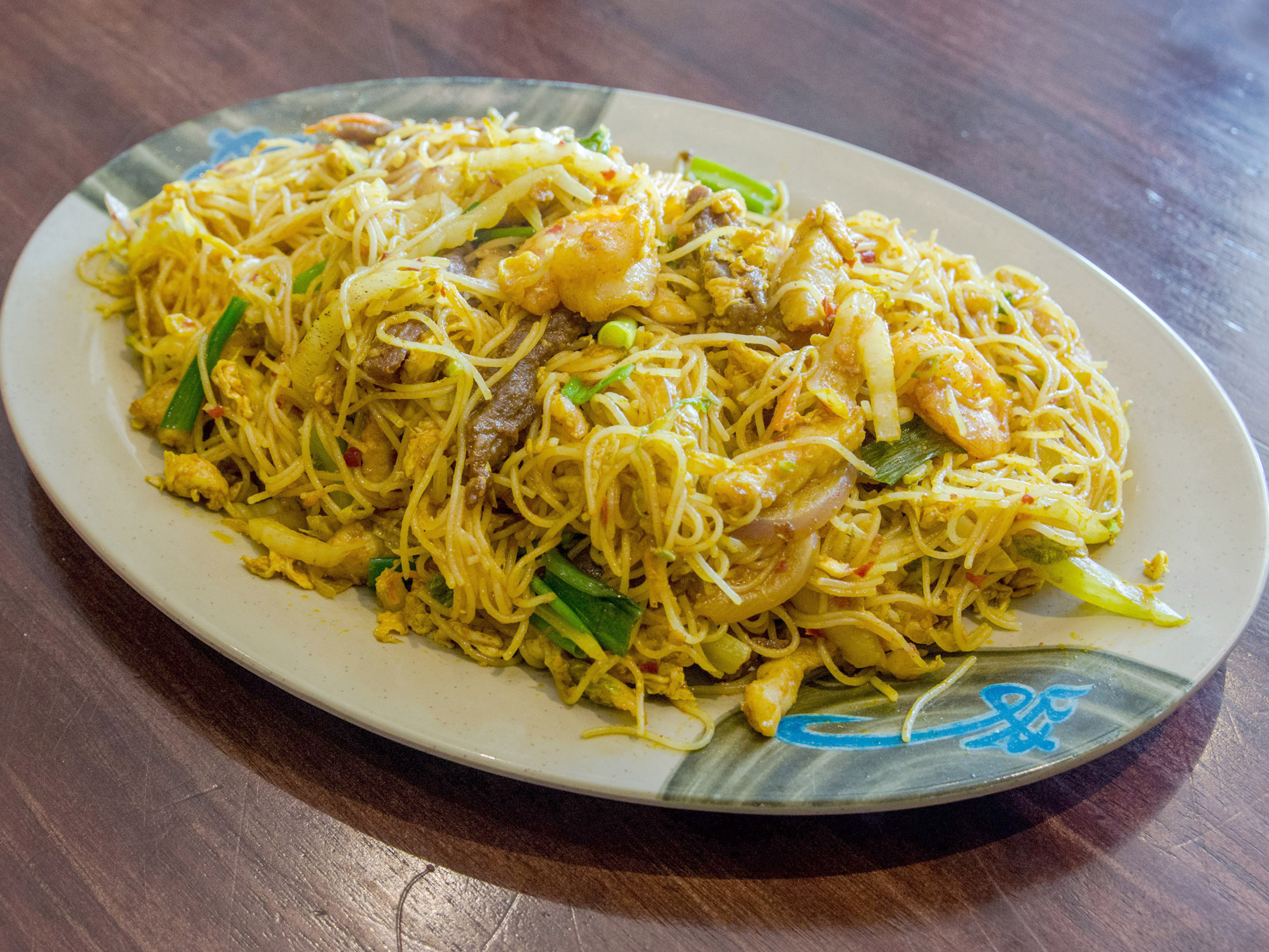 Order 56. Singapore Chow Mein Fun food online from Hunan Cafe store, Gaithersburg on bringmethat.com