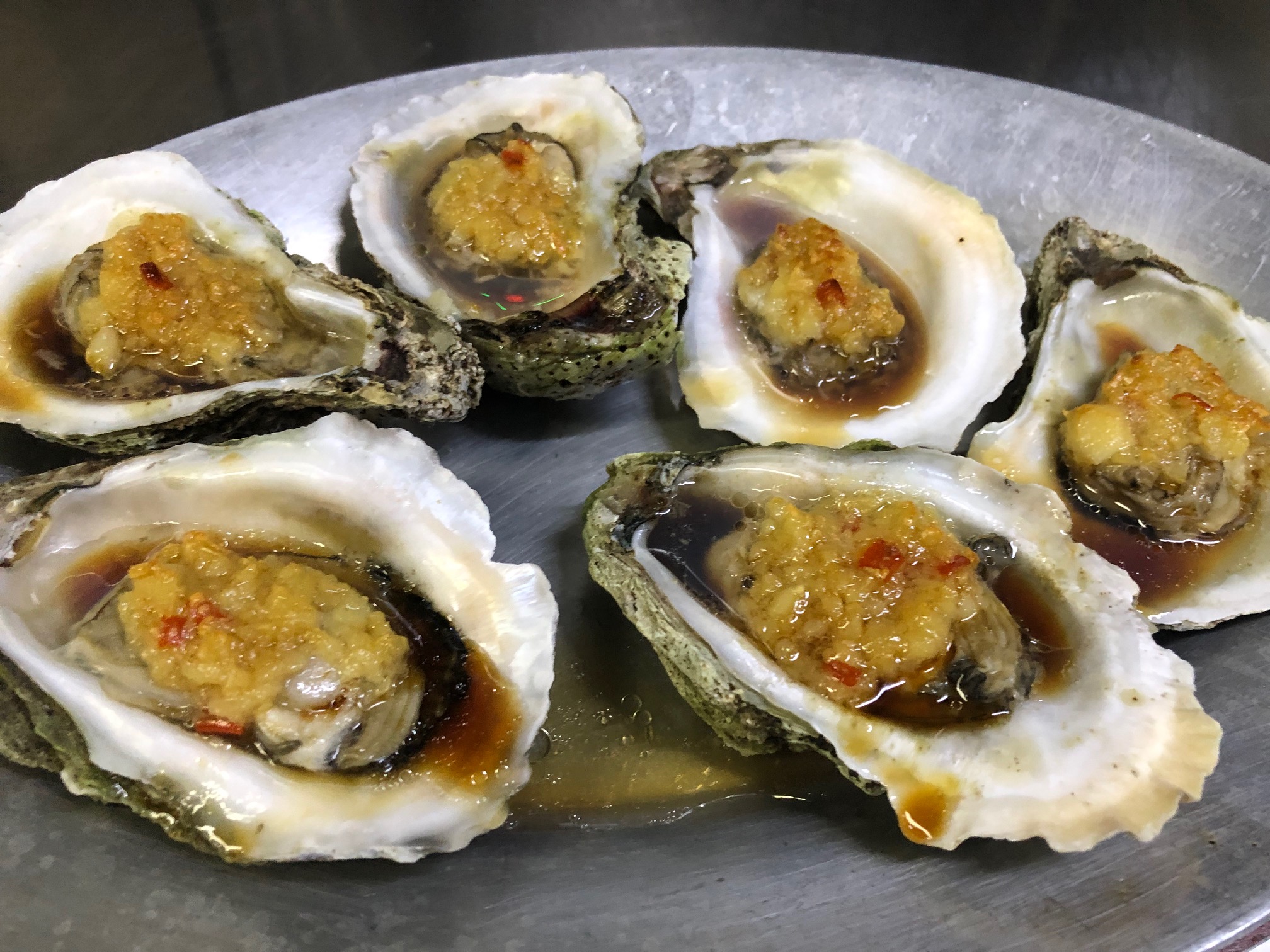 Order Grilled Oysters w. Minced Garlic (6) food online from Crazy boil store, State College on bringmethat.com
