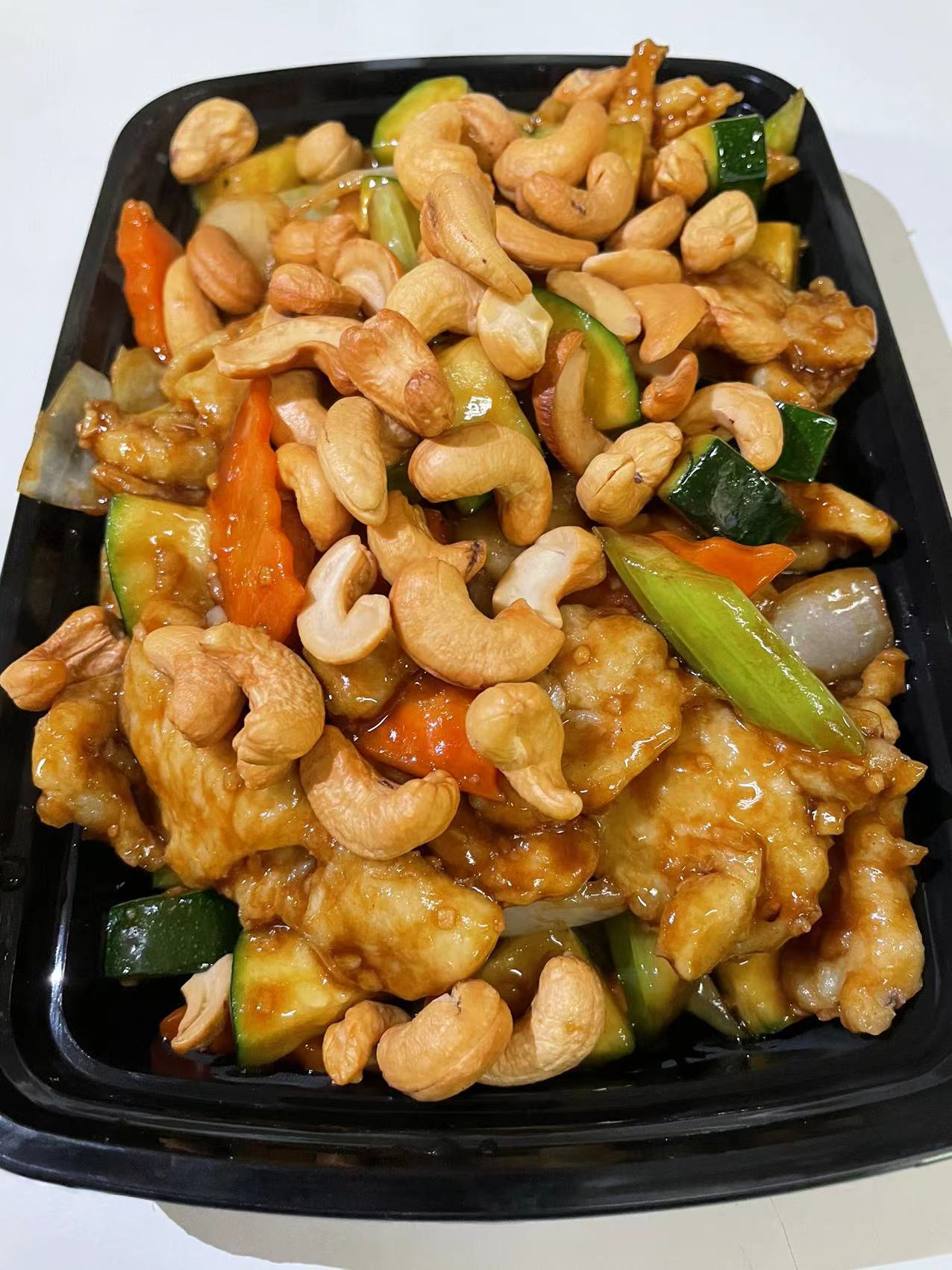 Order 47. Cashew Chicken food online from King Kong Chinese Restaurant store, Oakland on bringmethat.com