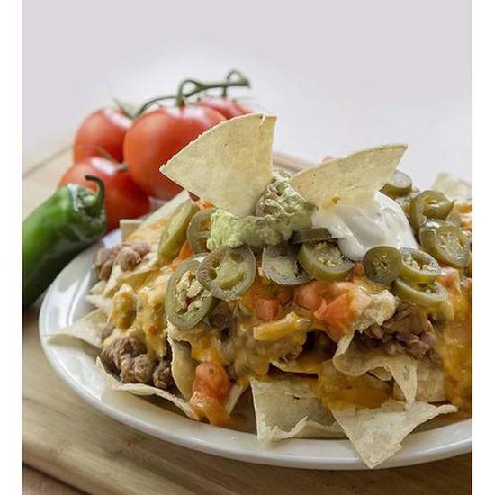 Order Nacho Supreme food online from Twisters Burgers & Burritos store, Albuquerque on bringmethat.com