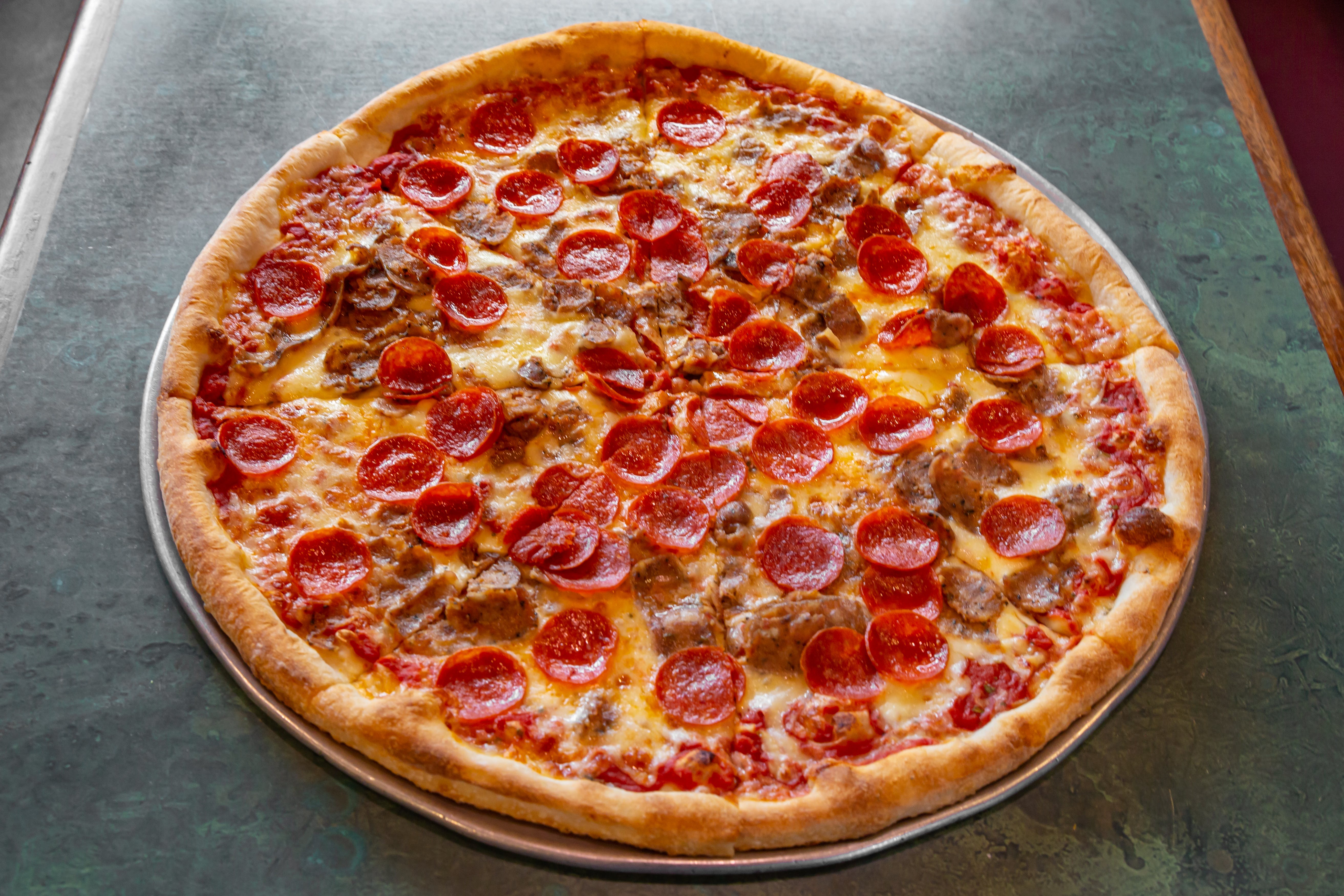 Order Meat Lovers Pizza - 16" food online from Tony's Pizza store, Medford on bringmethat.com