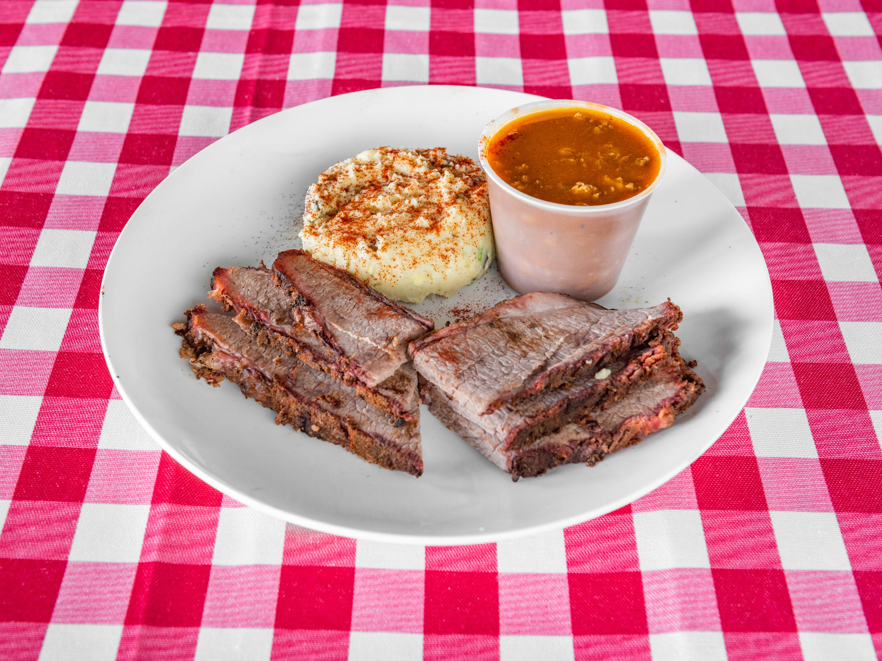 Order 1lb of Brisket food online from Shaws Country Kitchen store, Round Rock on bringmethat.com