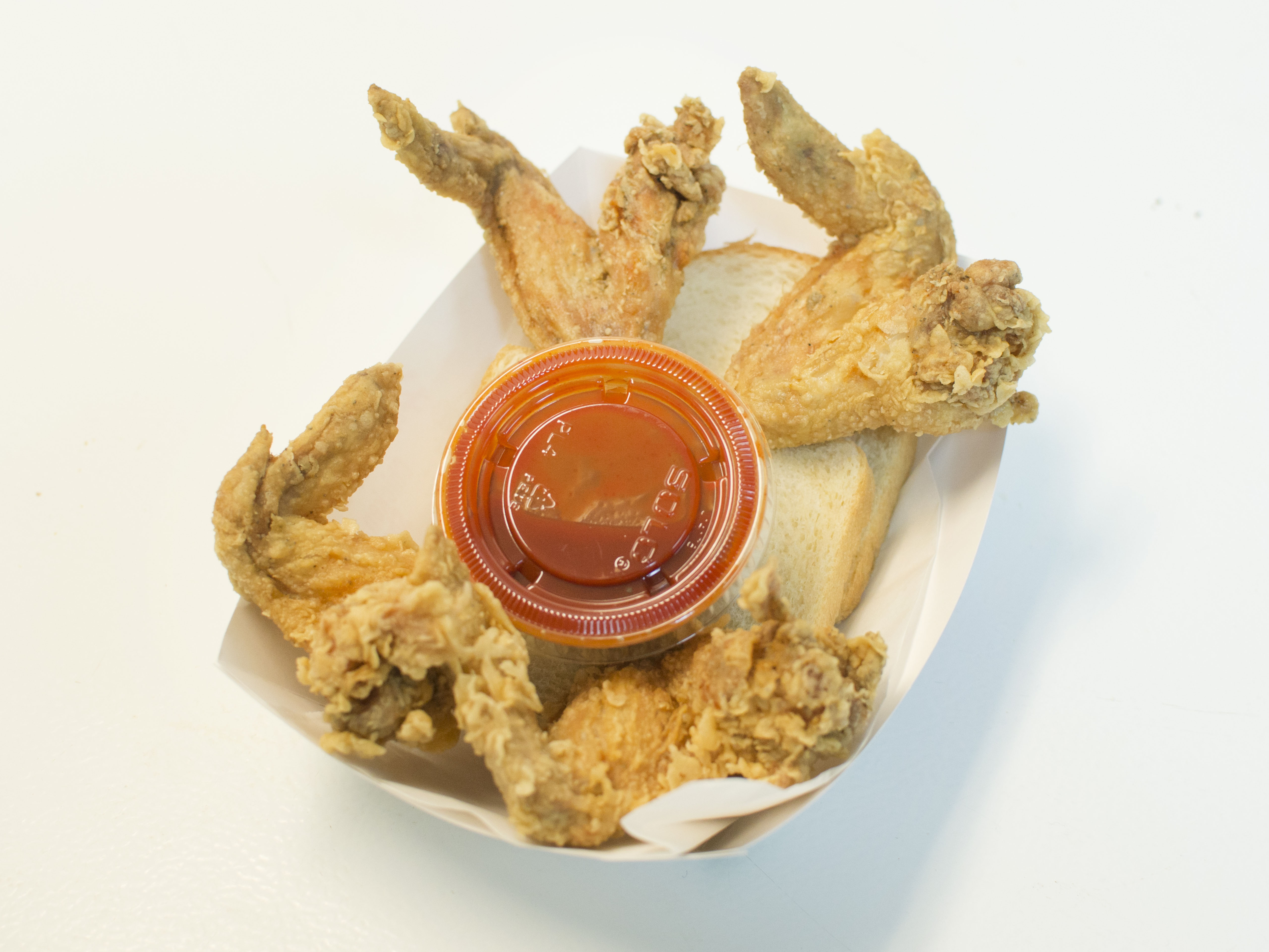 Order 4 Wings food online from Harolds Chicken Shack store, Chicago on bringmethat.com