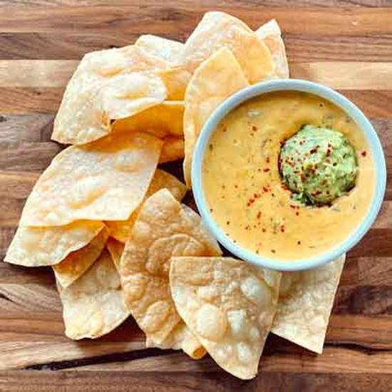 Order Chi'Jeu Queso and Chips food online from Chi'lantro store, Austin on bringmethat.com