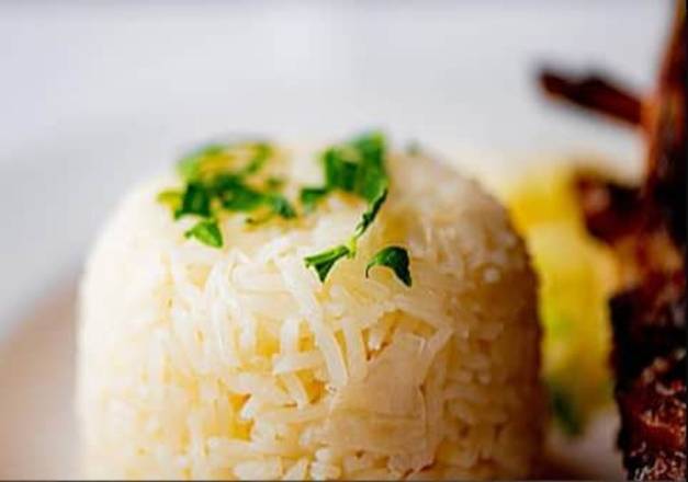 Order White Rice food online from Oliveira Restaurant store, Peabody on bringmethat.com
