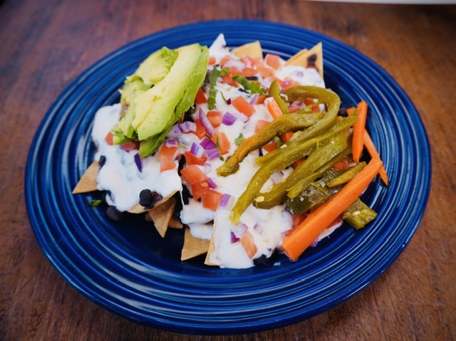 Order Nachos (Homemade Chips) Choose a Protein food online from Ollin store, New York on bringmethat.com