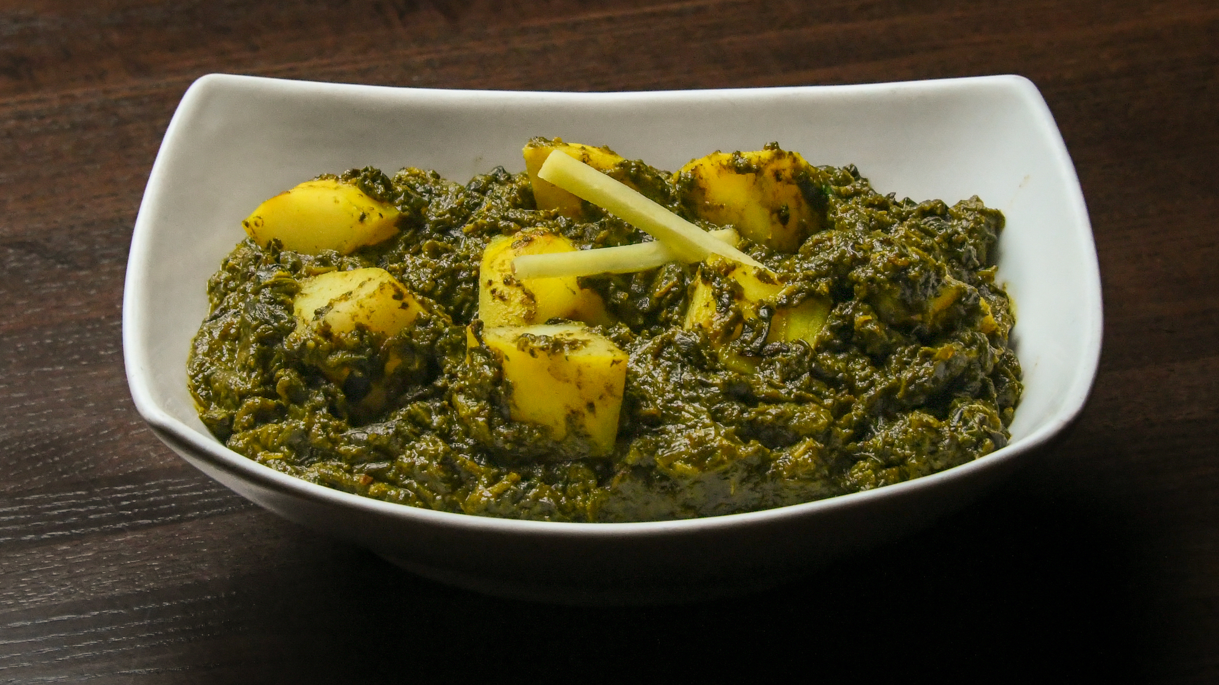 Order Aloo Saag food online from Mild 2 Spicy store, Chicago on bringmethat.com