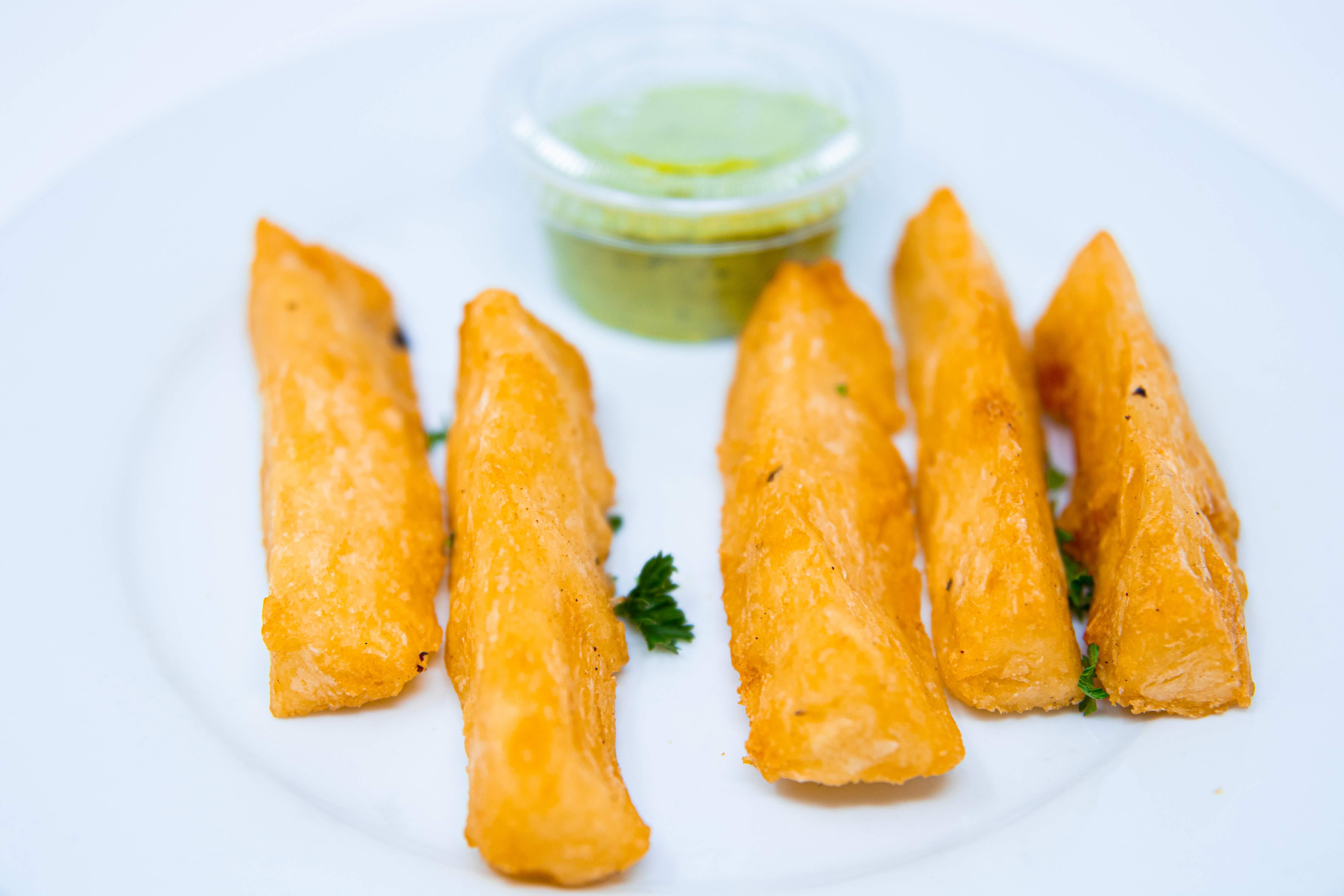 Order Yuca Frita food online from Cafe Con Leche store, Seattle on bringmethat.com