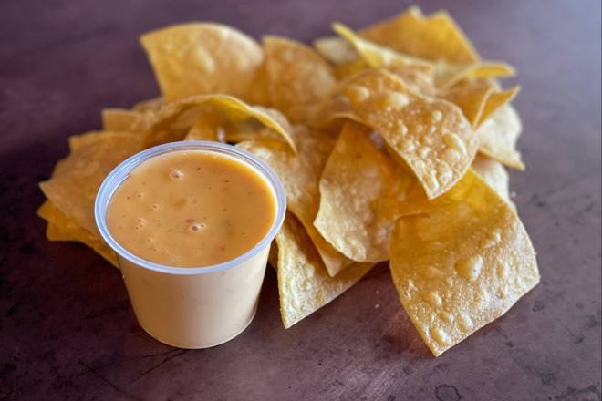 Order chips & queso food online from Taco Bamba store, Rockville on bringmethat.com