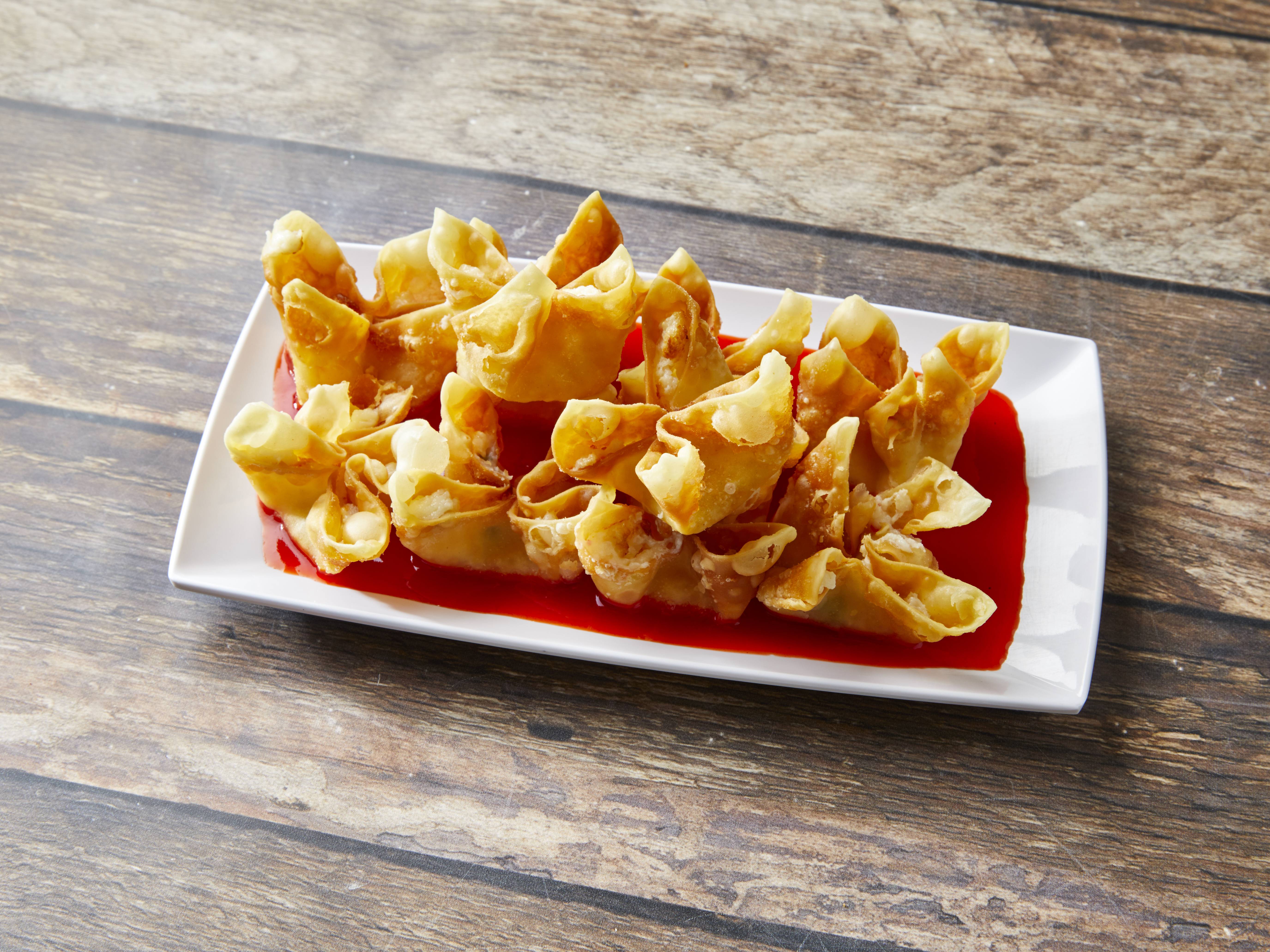 Order 20. Crab Rangoon food online from New China One store, Detroit on bringmethat.com