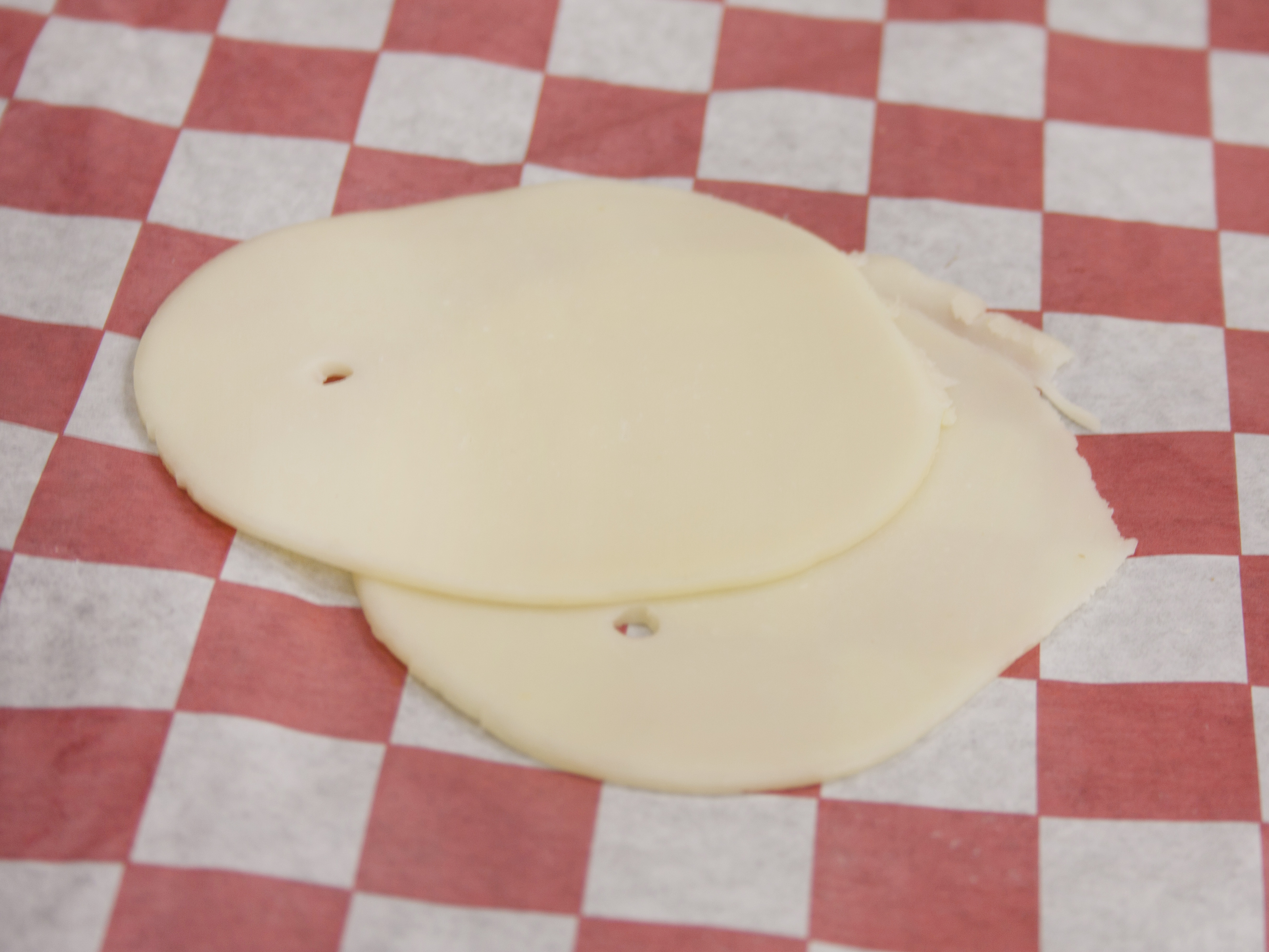 Order 1 lb. Provolone Cheese food online from Weaver's Market & Deli store, Logan on bringmethat.com